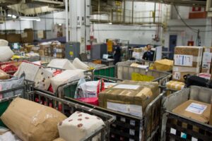 Packages await processing at CBP’s mail processing facility located at JFK International Airport