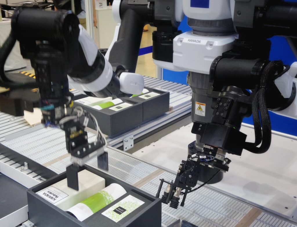 Automated factory robots assembling products